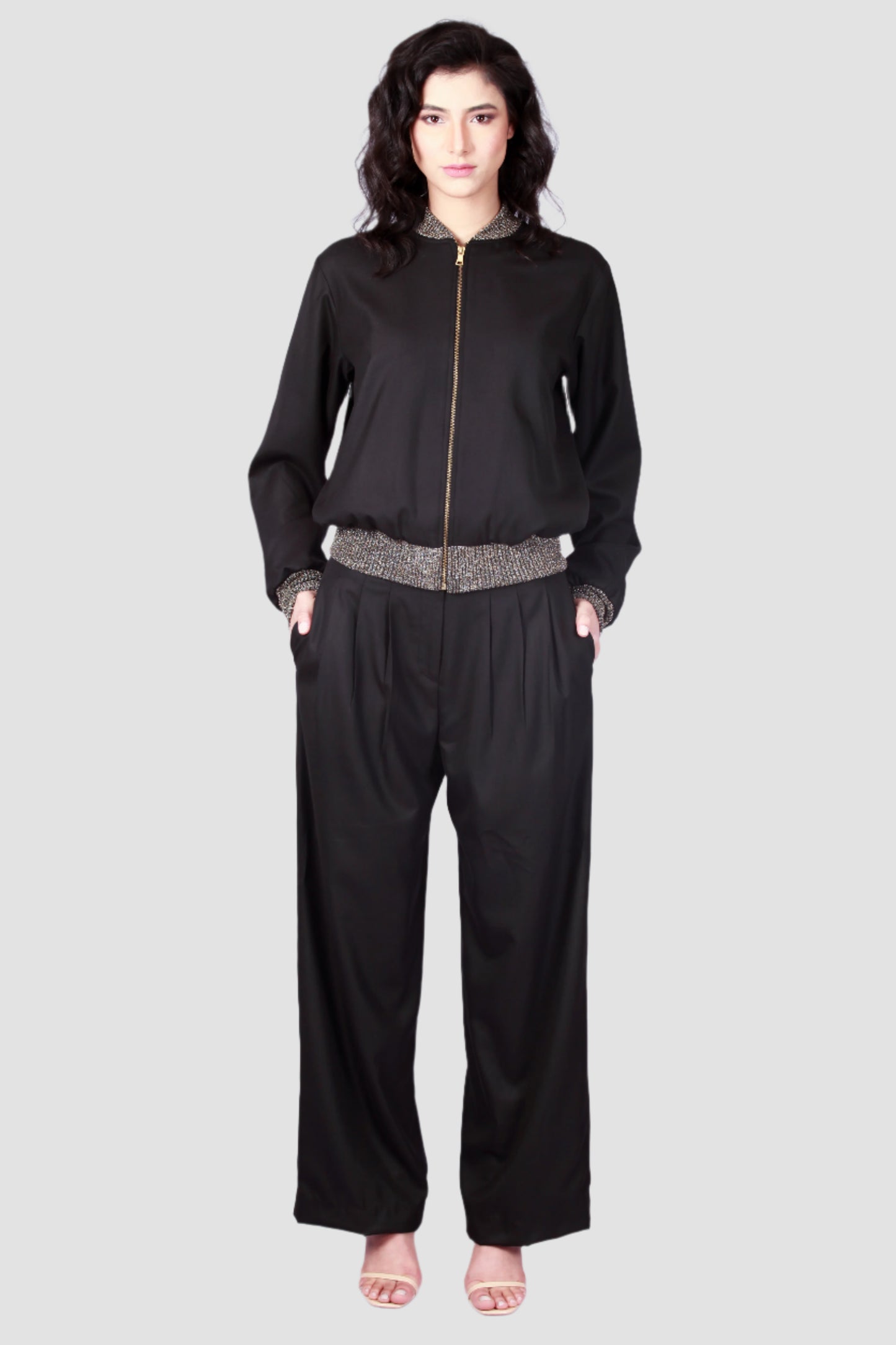 Bomber noir avec détails dorés