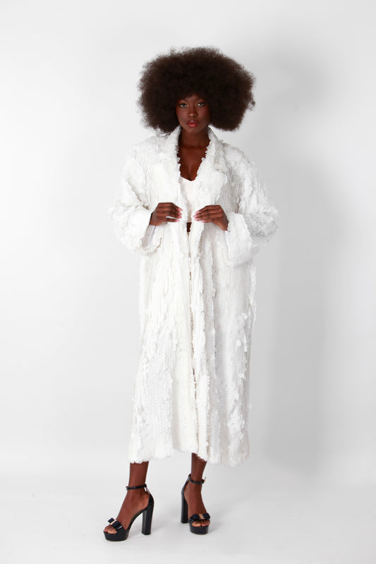 Manteau blanc à paillettes longues 